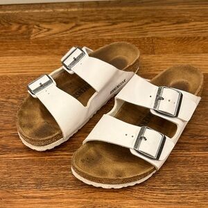 Birkenstock White Sandals with Metallic Buckles